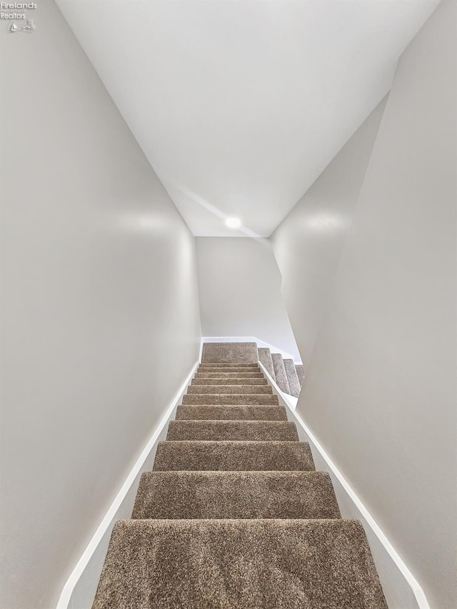 217 Ott St, Clyde, OH 43410 - staircase with lofted ceiling