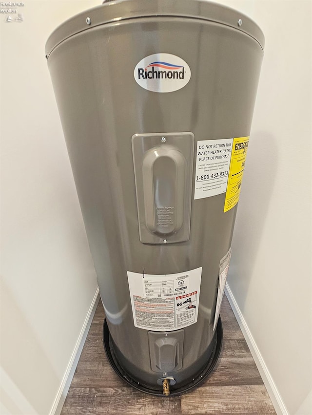 217 Ott St, Clyde, OH 43410 - detailed view of water heater and wood finished floors