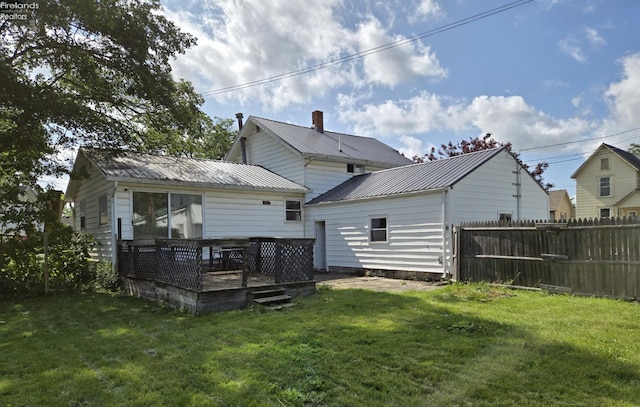 519 Howard St, Findlay, OH 45840 - rear view of house featuring a deck and a metal roof
