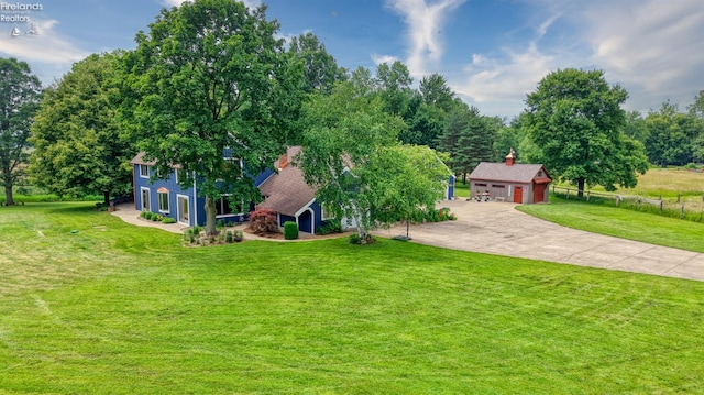 500 E State Route 61, Norwalk, OH 44857 - view of front of property with an outdoor structure, a garage, and concrete driveway