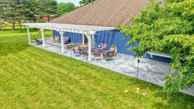 500 E State Route 61, Norwalk, OH 44857 - view of grassy yard featuring a pergola, a patio, and an outdoor living space with a fire pit