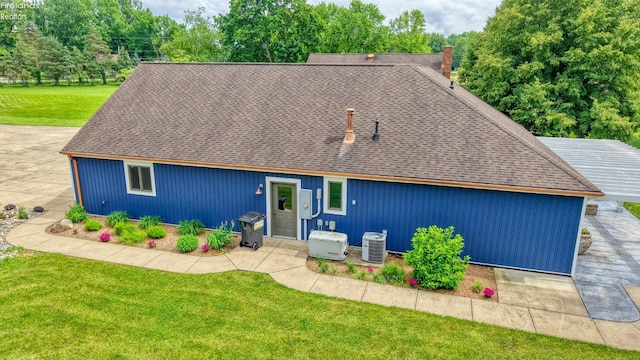 500 E State Route 61, Norwalk, OH 44857 - view of front of house with a front lawn, roof with shingles, and a patio area