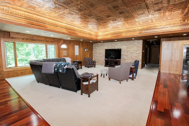 500 E State Route 61, Norwalk, OH 44857 - living area with an ornate ceiling, wood walls, a raised ceiling, and wood-type flooring