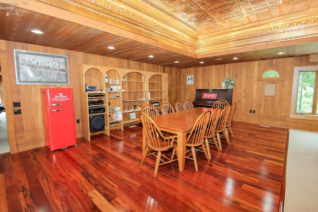 500 E State Route 61, Norwalk, OH 44857 - dining space featuring wood walls, wood finished floors, an ornate ceiling, and a tray ceiling