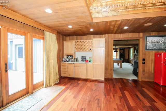 500 E State Route 61, Norwalk, OH 44857 - kitchen featuring wooden ceiling, wooden walls, dishwasher, wood finished floors, and light countertops