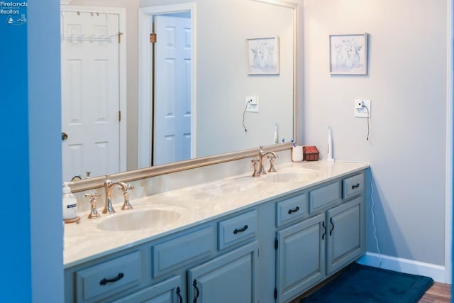 423 Leisure Dr, Huron, OH 44839 - full bath with double vanity and wood finished floors