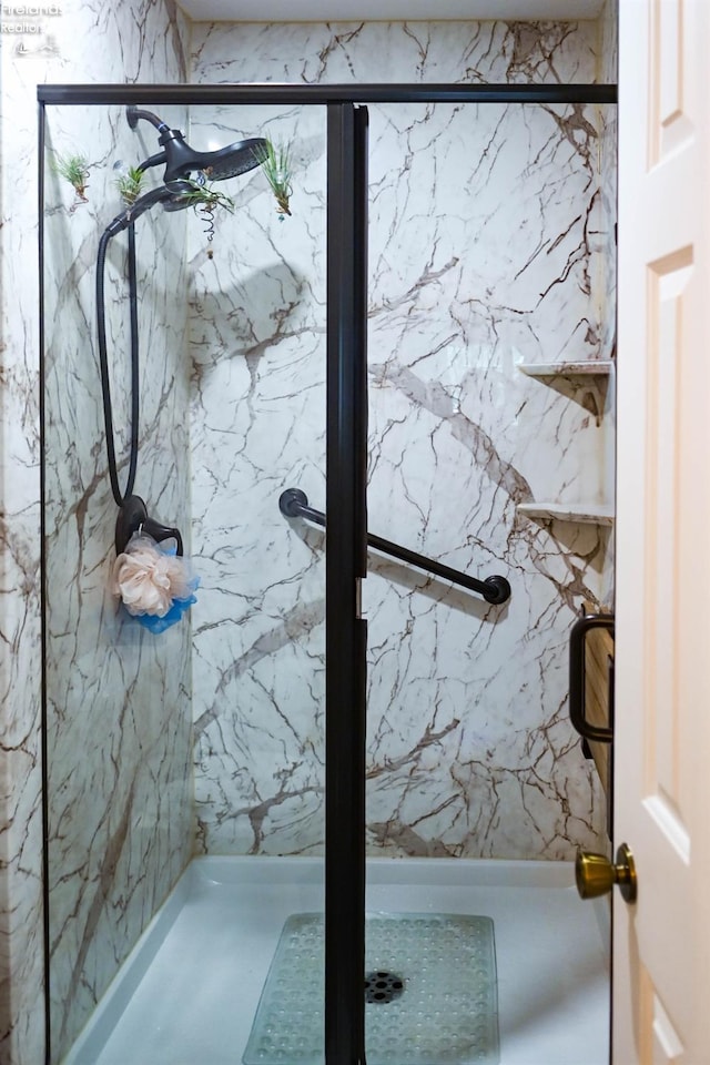 423 Leisure Dr, Huron, OH 44839 - bathroom featuring a marble finish shower