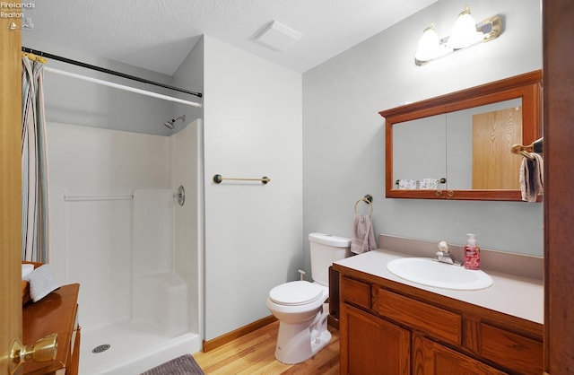 408 Forest St, Lagrange, OH 44050 - bathroom with wood finished floors, curtained shower, and vanity