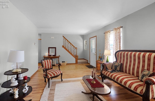 408 Forest St, Lagrange, OH 44050 - living area with stairway and wood finished floors