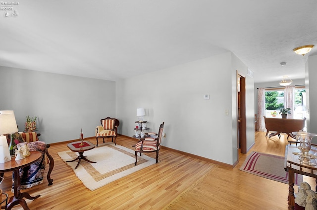 408 Forest St, Lagrange, OH 44050 - sitting room with light wood finished floors and baseboards