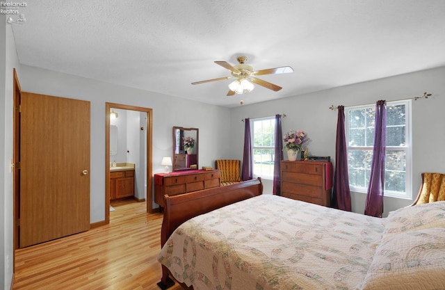408 Forest St, Lagrange, OH 44050 - bedroom featuring light wood finished floors, a ceiling fan, and connected bathroom