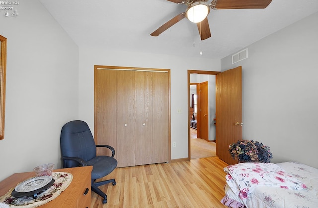408 Forest St, Lagrange, OH 44050 - bedroom featuring wood finished floors, a closet, an office area, and a ceiling fan