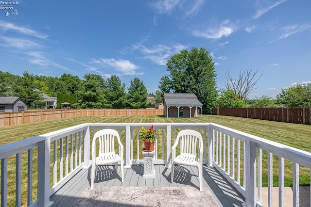 408 Forest St, Lagrange, OH 44050 - wooden terrace featuring a storage unit and a fenced backyard
