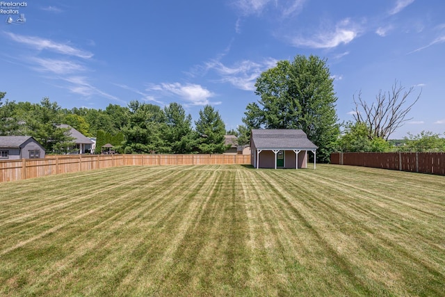 408 Forest St, Lagrange, OH 44050 - fenced backyard with a storage shed