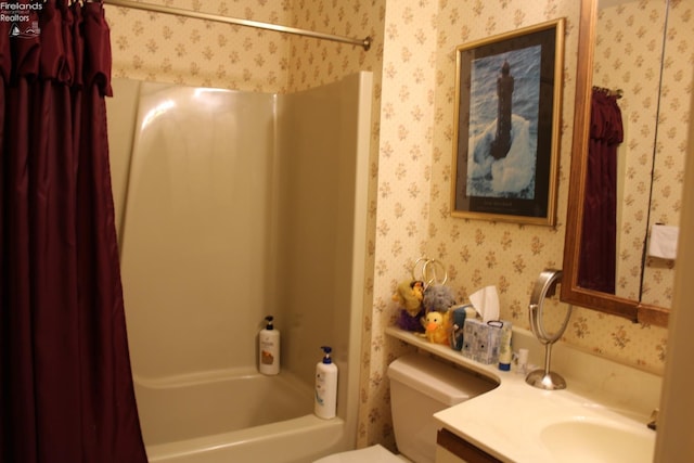 1507 Cleveland Rd Unit 423, Huron, OH 44839 - full bathroom featuring wallpapered walls, shower / bath combo, and vanity