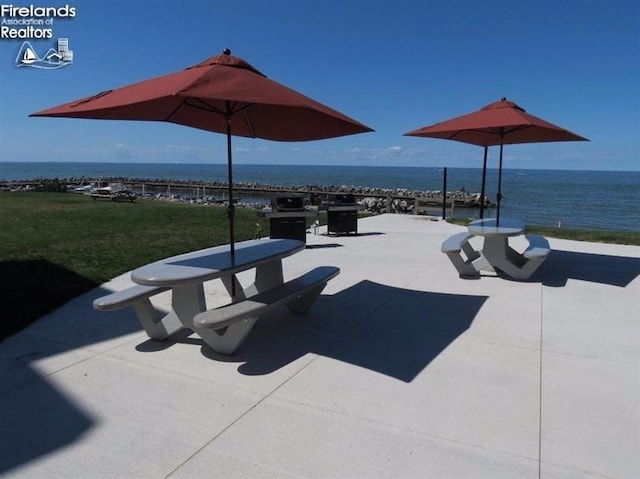 1507 Cleveland Rd Unit 423, Huron, OH 44839 - view of community with a water view and a patio area