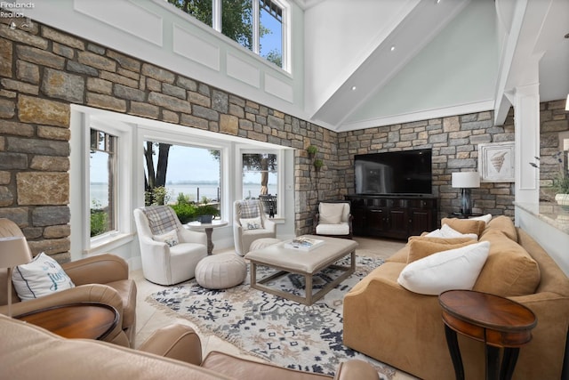 1115 Cedar Point Rd, Sandusky, OH 44870 - living room with a high ceiling, decorative columns, plenty of natural light, and beamed ceiling