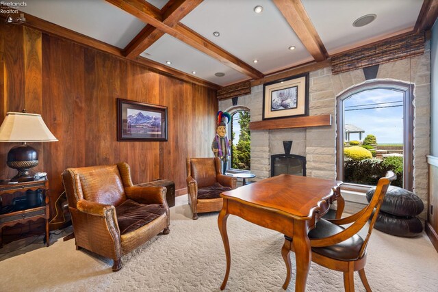 1115 Cedar Point Rd, Sandusky, OH 44870 - carpeted office with a fireplace, beam ceiling, and wooden walls