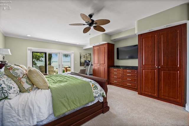 1115 Cedar Point Rd, Sandusky, OH 44870 - bedroom with access to exterior, light colored carpet, recessed lighting, ceiling fan, and crown molding