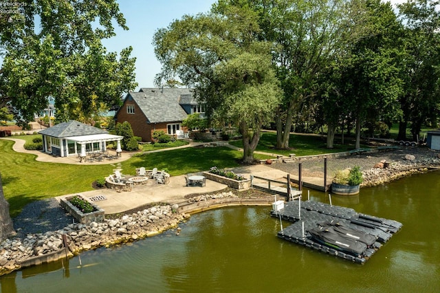 1115 Cedar Point Rd, Sandusky, OH 44870 - dock featuring an outdoor fire pit, a patio, a lawn, and a water view