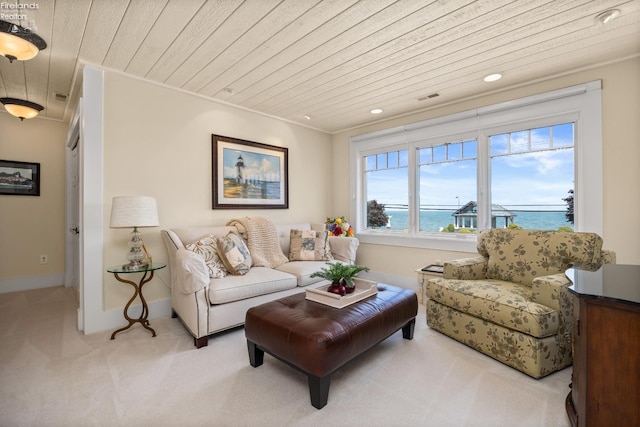 1115 Cedar Point Rd, Sandusky, OH 44870 - living area featuring wood ceiling, carpet flooring, recessed lighting, a water view, and crown molding
