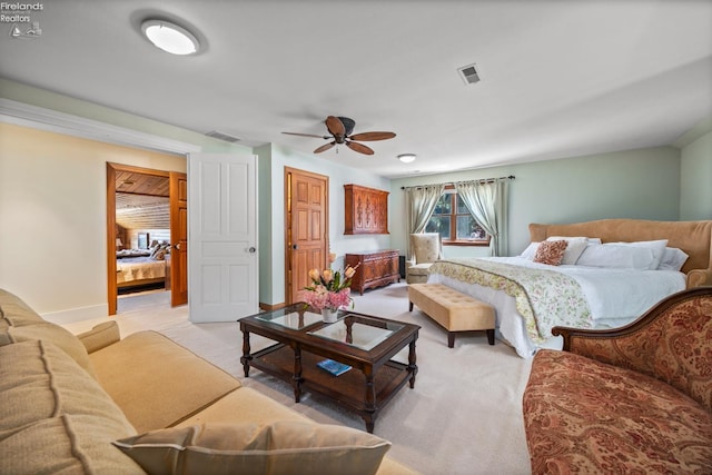 1115 Cedar Point Rd, Sandusky, OH 44870 - bedroom with light colored carpet and a ceiling fan