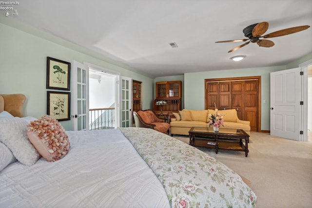 1115 Cedar Point Rd, Sandusky, OH 44870 - bedroom with light carpet and a ceiling fan