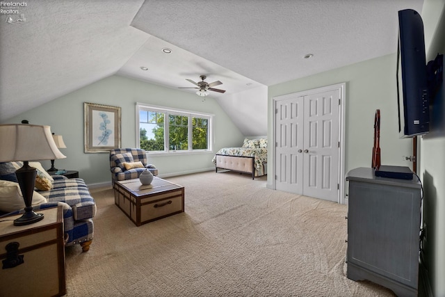 1115 Cedar Point Rd, Sandusky, OH 44870 - carpeted bedroom with a textured ceiling, lofted ceiling, a ceiling fan, and a closet