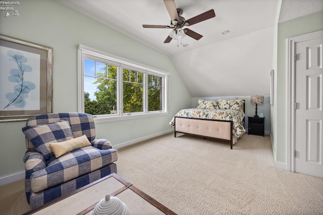 1115 Cedar Point Rd, Sandusky, OH 44870 - carpeted bedroom featuring vaulted ceiling and a ceiling fan