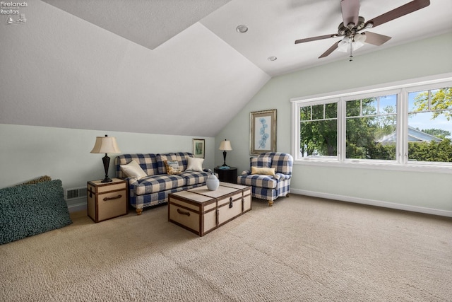 1115 Cedar Point Rd, Sandusky, OH 44870 - carpeted living area with lofted ceiling and a ceiling fan