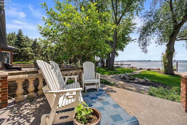 1115 Cedar Point Rd, Sandusky, OH 44870 - view of patio / terrace with a water view