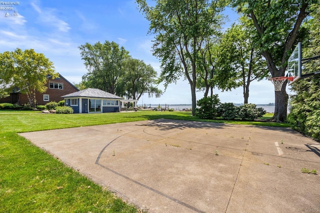 1115 Cedar Point Rd, Sandusky, OH 44870 - view of grassy yard with basketball hoop