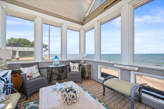 1115 Cedar Point Rd, Sandusky, OH 44870 - sunroom featuring vaulted ceiling and a water view