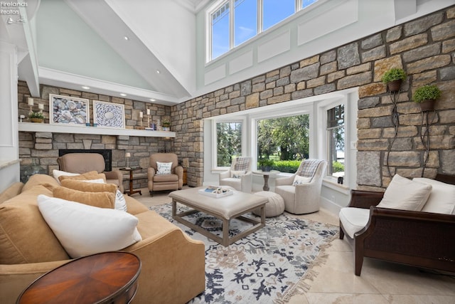 1115 Cedar Point Rd, Sandusky, OH 44870 - tiled living room with a towering ceiling, a stone fireplace, and recessed lighting