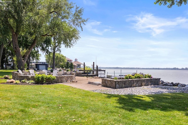 1115 Cedar Point Rd, Sandusky, OH 44870 - view of community with a yard, a water view, and a patio area