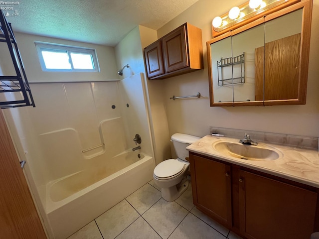 3106 E County Road 50, Tiffin, OH 44883 - bathroom with a textured ceiling, vanity,  shower combination, and tile patterned flooring
