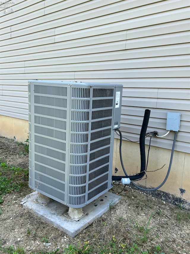 3106 E County Road 50, Tiffin, OH 44883 - exterior view of a central AC unit