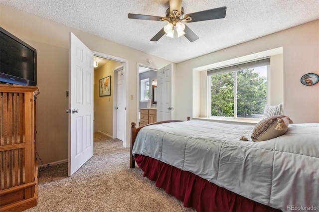 693 Delwood Ct, Highlands Ranch, CO 80126 - carpeted bedroom with a textured ceiling, ensuite bath, and a ceiling fan