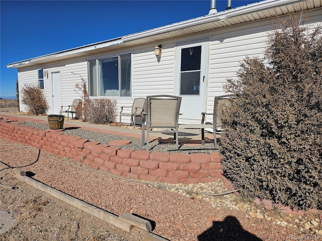 back of house with a patio area