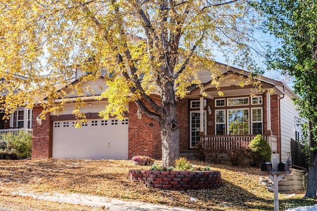 view of front of house with a garage and a porch