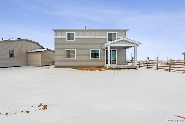 view of snow covered property