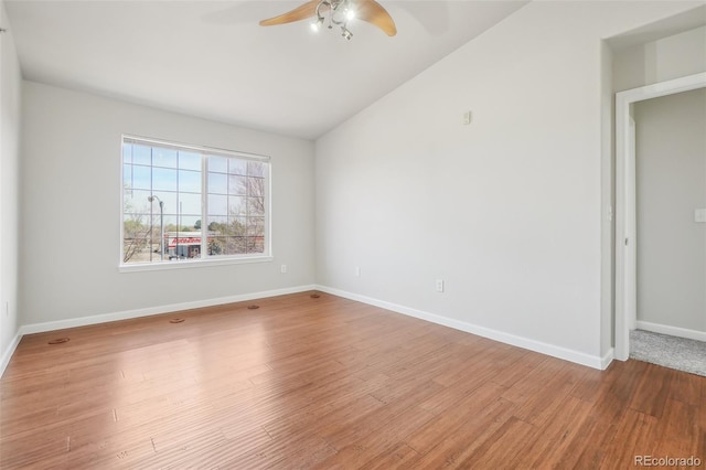 12711 Colorado Blvd Unit 1009, Thornton, CO 80241 - empty room with ceiling fan, lofted ceiling, wood finished floors, and baseboards