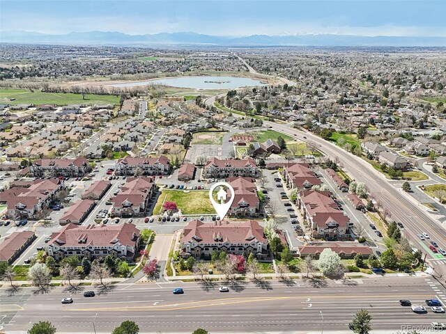 12711 Colorado Blvd Unit 1009, Thornton, CO 80241 - aerial view of property's location featuring a water and mountain view and nearby suburban area