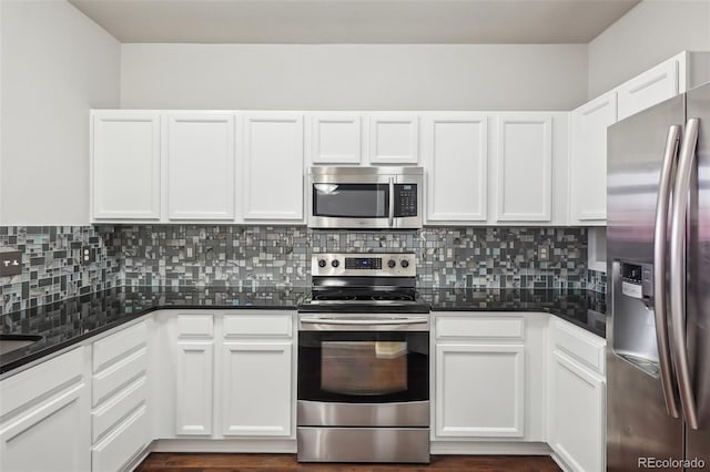 12711 Colorado Blvd Unit 1009, Thornton, CO 80241 - kitchen with stainless steel appliances, white cabinets, and decorative backsplash