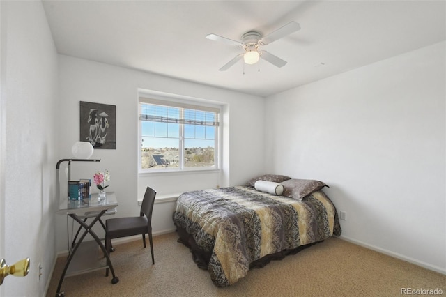 bedroom featuring carpet floors, baseboards, and ceiling fan