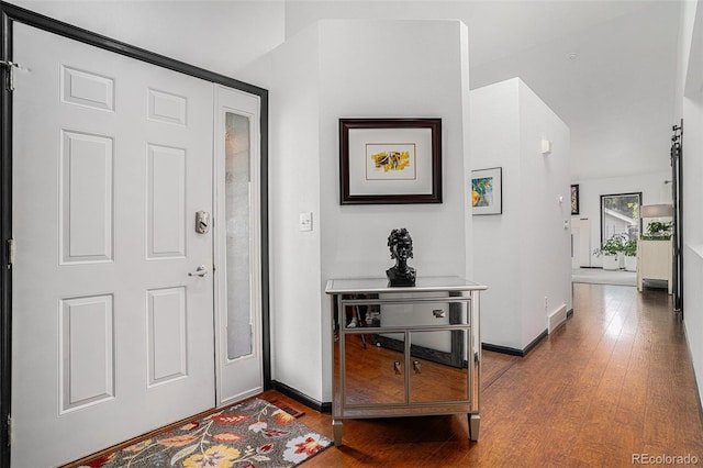 403 Captains Ct, Fort Collins, CO 80524 - foyer featuring wood finished floors and baseboards
