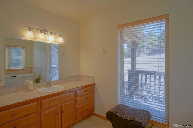 bathroom featuring tile flooring and vanity