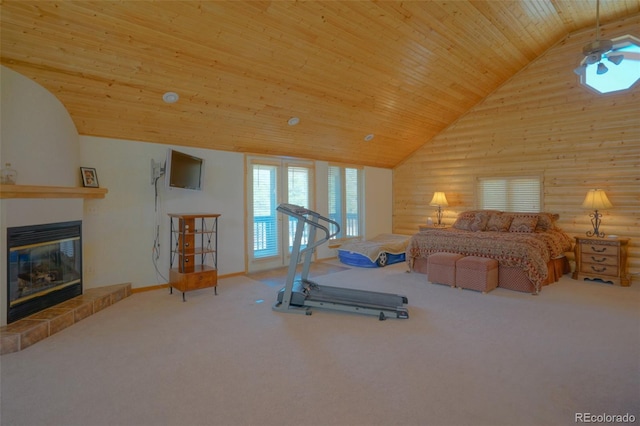 carpeted bedroom with high vaulted ceiling, rustic walls, and wood ceiling