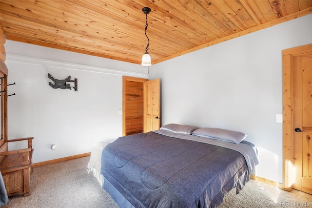 carpeted bedroom featuring wooden ceiling