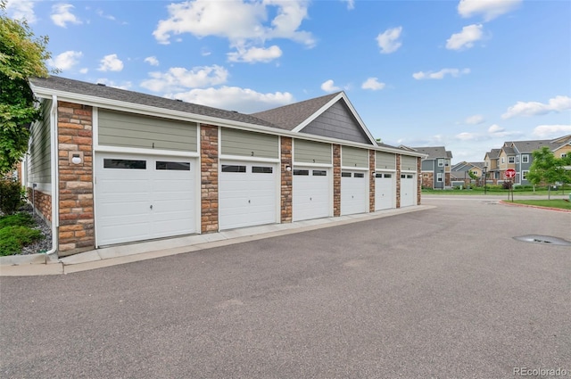 12940 Jasmine St Unit A, Thornton, CO 80602 - garage featuring a residential view